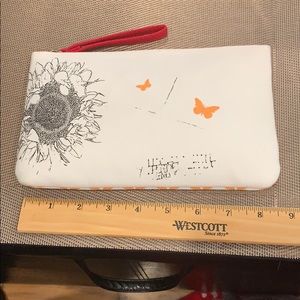 Clarins cosmetic zippered bag. New. No stains/rips